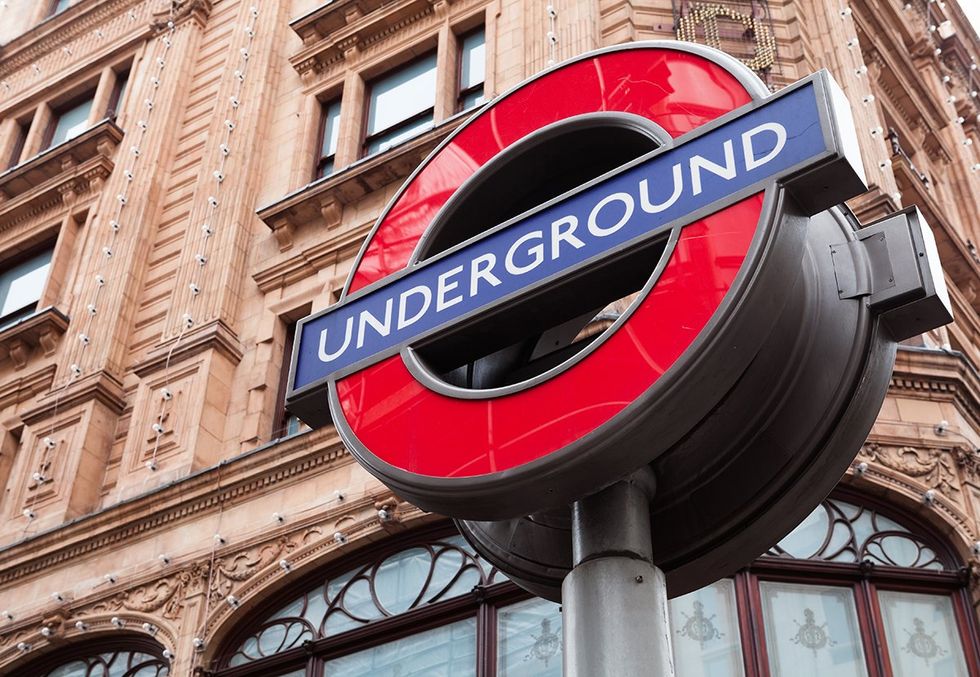 A sign for the Underground (aka \u201cthe Tube\u201d) in London, United Kingdom