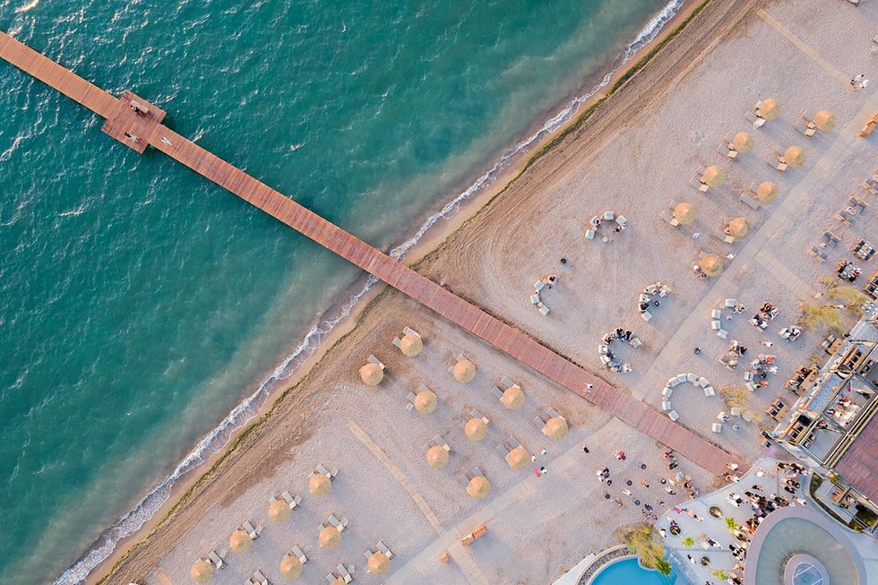 An aerial view of the beach at W Costa Navarino