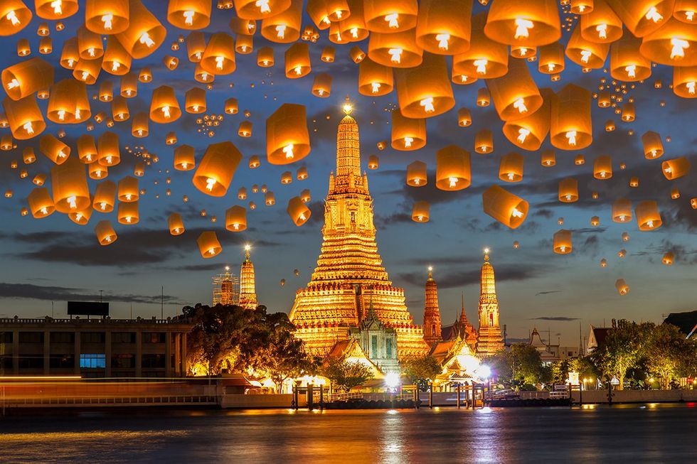 Floating lamps in the Yee Peng Festival at Wat Arun in Bangkok, Thailand