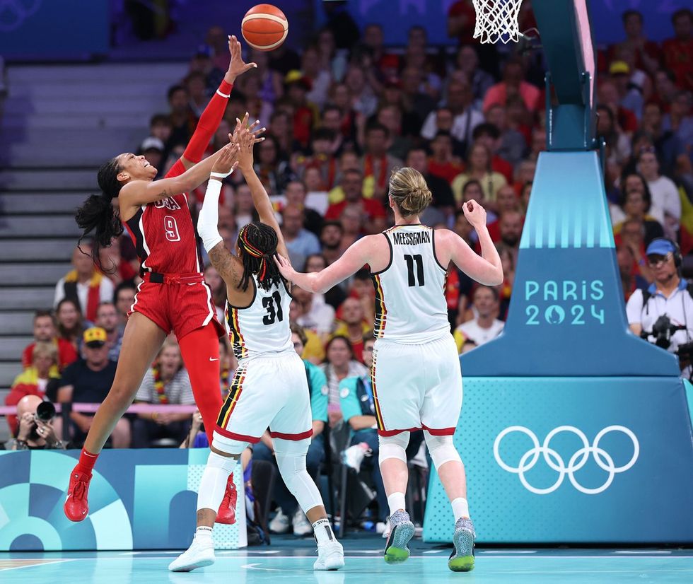 LILLE, FRANCE - AUGUST 01: A'Ja Wilson #9 of Team United States shoots over Maxuella Lisowa Mbaka #31 of Team Belgium during a Women's Basketball Group Phase - Group C game between the United States and Belgium on day six of the Olympic Games Paris 2024 at Stade Pierre Mauroy on August 01, 2024 in Lille, France. (Photo by Gregory Shamus/Getty Images)