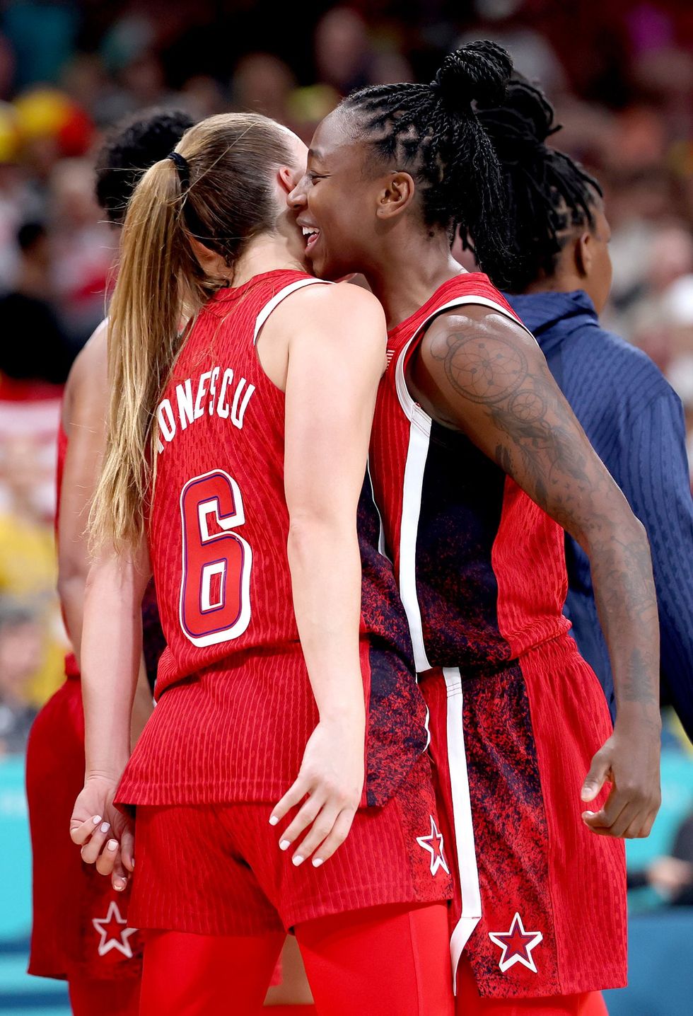 LILLE, FRANCE - AUGUST 01: Sabrina Ionescu #6 and Jewell Loyd #4 of Team United States celebrate with a chest bump during a Women's Basketball Group Phase - Group C game between the United States and Belgium on day six of the Olympic Games Paris 2024 at Stade Pierre Mauroy on August 01, 2024 in Lille, France. (Photo by Gregory Shamus/Getty Images)