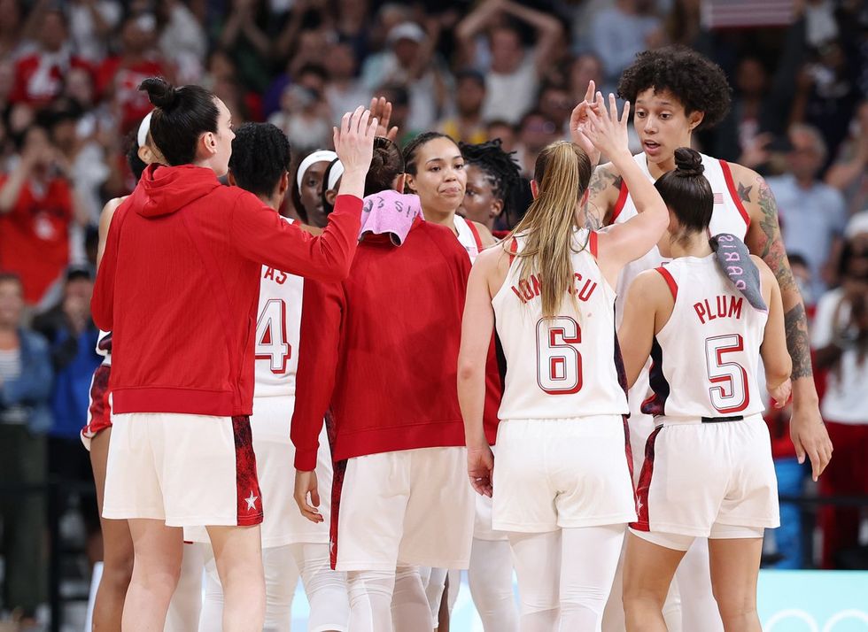 LILLE, FRANCE - JULY 29: Team United States huddles during the Women's Group Phase - Group C game between Japan and United States on day three of the Olympic Games Paris 2024 at Stade Pierre Mauroy on July 29, 2024 in Lille, France. (Photo by Gregory Shamus/Getty Images)