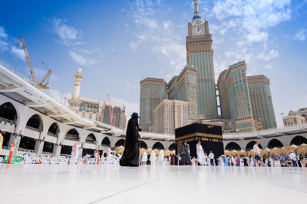 Masjid al-Haram (Great Mosque) with Makkah Clock Royal Tower, a Fairmont Hotel in the background, in Mecca, Saudi Arabia