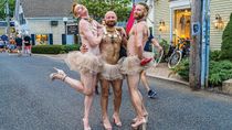 Provincetown Carnival Parade: Land of Toys with many Barbie dolls