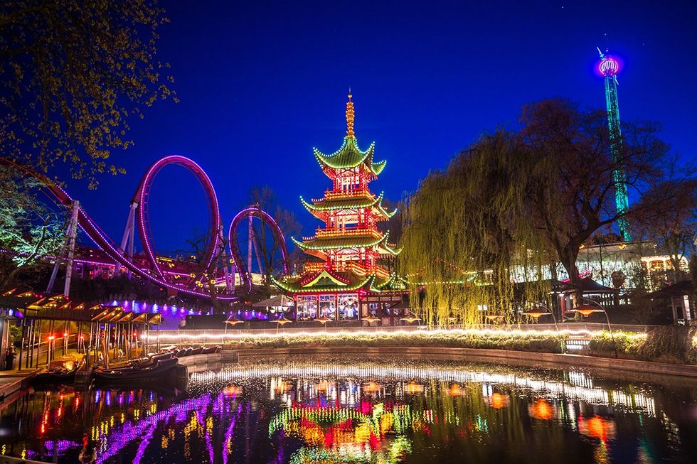 These are the safest countries for LGBTQ+ travelers this fall \u2013 The lights of Tivoli Gardens at night in Copenhagen, Denmark